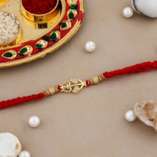 Trishul & Damru Bhaiya Rakhi with Decorative Kumkum-Chawal Thali, Greeting Card, and Chocolate for Raksha Bandhan