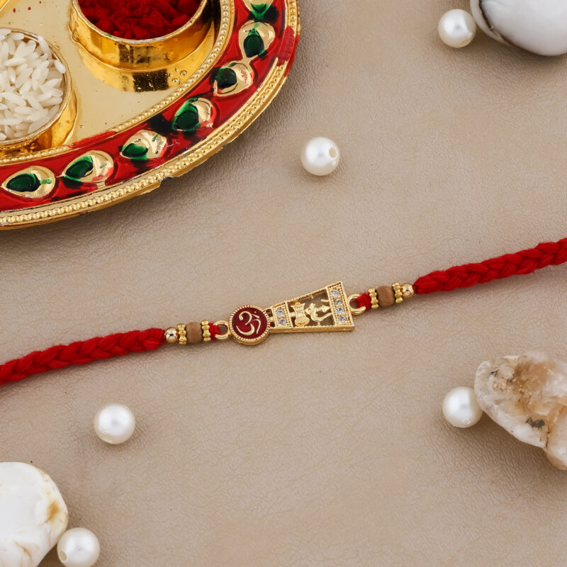 Designer Mandir & Om Bhai Rakhi with Decorative Red Thread and Beads for Raksha Bandhan Designer Mandir & Om Bhai Rakhi with Decorative Red Thread and Beads for Raksha Bandhan