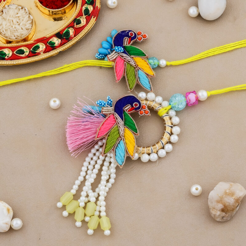 Colourful Bhaiya-Bhabhi Rakhi Combo with Parrot Design, Beadwork, Tassels, Decorative Thali & Chocolate for Raksha Bandhan