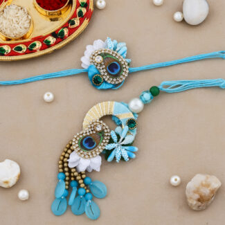 Elegant Bhaiya-Bhabhi Rakhi Combo with Blue Beads, Peacock Feather, Floral Accents, Tassels, Decorative Thali & Chocolate for Raksha Bandhan