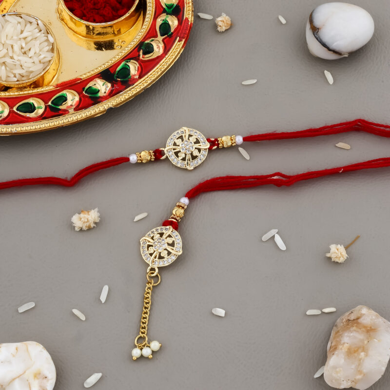 Elegant Golden Bhaiya-Bhabhi Designer Rakhi Set with Decorative Thali, Greeting Card & Chocolate for Raksha Bandhan