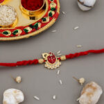 Shreenath Ji Rakhi for Bhai with Greeting Card, Chocolate, and Festive Packaging
